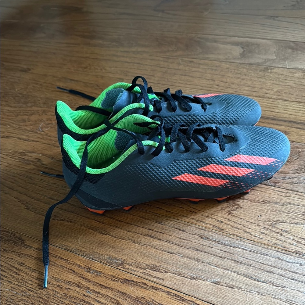 Adidas unisex Speedportal Kids Soccer cleats - Black, Green, and Red like new!